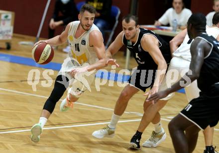 Basketball Zweite Liga 2020/2021. Grunddurchgang 3. Runde. Woerthersee Piraten gegen  RAIDERS Tirol. Martin Bajc,  (Piraten), Oliver Vujakovic (Tirol). Klagenfurt, am 10.10.2020.
Foto: Kuess
www.qspictures.net

---
pressefotos, pressefotografie, kuess, qs, qspictures, sport, bild, bilder, bilddatenbank