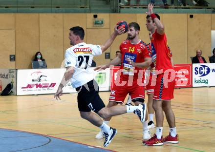 Handball. HLA. SC Kelag Ferlach gegen UHK Krems. Blaz Klec (Ferlach), Fabian Posch (Krems). Ferlach, am 9.10.2020.
Foto: Kuess
---
pressefotos, pressefotografie, kuess, qs, qspictures, sport, bild, bilder, bilddatenbank