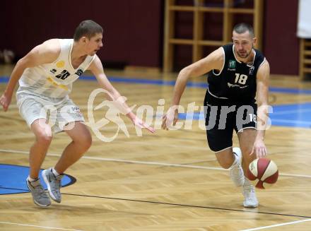 Basketball Zweite Liga 2020/2021. Grunddurchgang 3. Runde. Woerthersee Piraten gegen  RAIDERS Tirol. Tevz Ruzic,  (Piraten), Bogdan Rakic (Tirol). Klagenfurt, am 10.10.2020.
Foto: Kuess
www.qspictures.net

---
pressefotos, pressefotografie, kuess, qs, qspictures, sport, bild, bilder, bilddatenbank