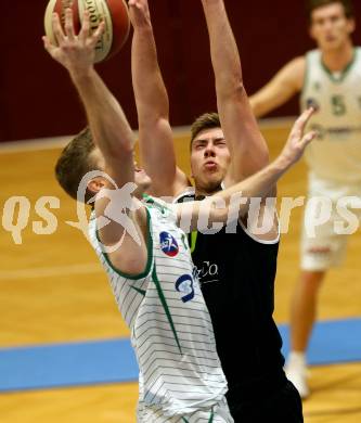 Basketball Zweite Liga 2020/2021. Grunddurchgang 8. Runde. KOS Celovec gegen Basket Flames. Jernej Heine Andolsek (KOS Celovec), Gabriel Stepan (Basket Flames). Klagenfurt, am 22.11.2020.
Foto: Kuess
www.qspictures.net

---
pressefotos, pressefotografie, kuess, qs, qspictures, sport, bild, bilder, bilddatenbank