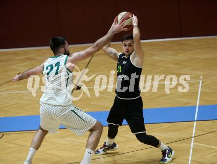 Basketball Zweite Liga 2020/2021. Grunddurchgang 8. Runde. KOS Celovec gegen Basket Flames.   Marin Sliskovic (KOS Celovec), Julian Alper (Basket Flames). Klagenfurt, am 22.11.2020.
Foto: Kuess
www.qspictures.net

---
pressefotos, pressefotografie, kuess, qs, qspictures, sport, bild, bilder, bilddatenbank