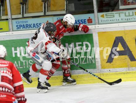 EBEL. Eishockey Bundesliga. KAC gegen	spusu Bratislava Capitals. Thomas Koch  (KAC), Higgs Brock (Bratislava). Klagenfurt, am 13.12.2020.
Foto: Kuess
www.qspictures.net

---
pressefotos, pressefotografie, kuess, qs, qspictures, sport, bild, bilder, bilddatenbank