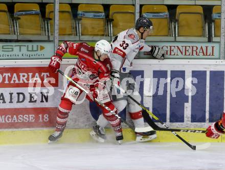 EBEL. Eishockey Bundesliga. KAC gegen	spusu Bratislava Capitals. Michael Kernberger (KAC), Filip Ahl (Bratislava). Klagenfurt, am 13.12.2020.
Foto: Kuess
www.qspictures.net

---
pressefotos, pressefotografie, kuess, qs, qspictures, sport, bild, bilder, bilddatenbank