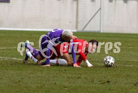 Fussball 2. Liga. SK Austria Klagenfurt gegen  FC Liefering.  Fabio Markelic (Klagenfurt),  Amar Dedic (Liefering). Klagenfurt, am 13.12.2020.
Foto: Kuess
www.qspictures.net
---
pressefotos, pressefotografie, kuess, qs, qspictures, sport, bild, bilder, bilddatenbank