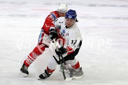 EBEL. Eishockey Bundesliga. KAC gegen	HC TIWAG Innsbruck. Michael Kernberger,  (KAC), Christof Kromp (Innsbruck). Klagenfurt, am 20.12.2020.
Foto: Kuess
www.qspictures.net

---
pressefotos, pressefotografie, kuess, qs, qspictures, sport, bild, bilder, bilddatenbank