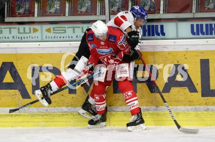 EBEL. Eishockey Bundesliga. KAC gegen	HC TIWAG Innsbruck. Paul Postma,  (KAC), Jonathan Racine-Clarke (Innsbruck). Klagenfurt, am 20.12.2020.
Foto: Kuess
www.qspictures.net

---
pressefotos, pressefotografie, kuess, qs, qspictures, sport, bild, bilder, bilddatenbank