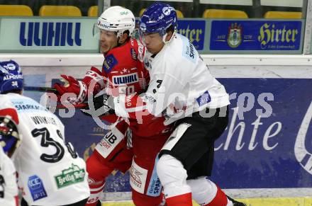 EBEL. Eishockey Bundesliga. KAC gegen	HC TIWAG Innsbruck. Matthew Fraser,  (KAC), Jonathan Racine-Clarke (Innsbruck). Klagenfurt, am 20.12.2020.
Foto: Kuess
www.qspictures.net

---
pressefotos, pressefotografie, kuess, qs, qspictures, sport, bild, bilder, bilddatenbank