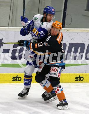 EBEL. Eishockey Bundesliga. VSV gegen Black Wings 1992 Linz.  Jordan Caron, (VSV), Gerd Kragl  (Linz). Villach, am 30.12.2020.
Foto: Kuess
www.qspictures.net
---
pressefotos, pressefotografie, kuess, qs, qspictures, sport, bild, bilder, bilddatenbank