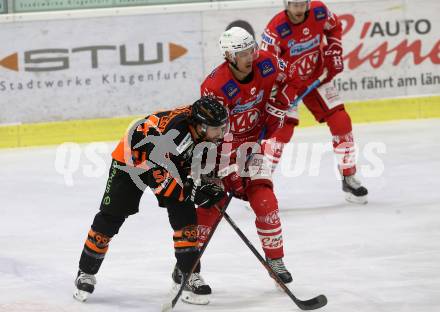 EBEL. Eishockey Bundesliga. KAC gegen	spusu Moser Medical Graz99ers.  Petersen Nicholas Eric (KAC), Cameranesi Anthony (Graz). Klagenfurt, am 30.12.2020.
Foto: Kuess
www.qspictures.net

---
pressefotos, pressefotografie, kuess, qs, qspictures, sport, bild, bilder, bilddatenbank