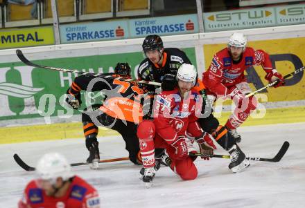 EBEL. Eishockey Bundesliga. KAC gegen	spusu Moser Medical Graz99ers.  Hundertpfund Thomas, Obersteiner Daniel, (KAC), Altmann Mario, Dodero Charles (Graz). Klagenfurt, am 30.12.2020.
Foto: Kuess
www.qspictures.net

---
pressefotos, pressefotografie, kuess, qs, qspictures, sport, bild, bilder, bilddatenbank