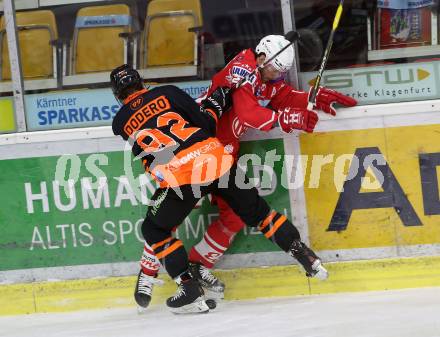 EBEL. Eishockey Bundesliga. KAC gegen	spusu Moser Medical Graz99ers.  Hundertpfund Thomas (KAC), Dodero Charles (Graz). Klagenfurt, am 30.12.2020.
Foto: Kuess
www.qspictures.net

---
pressefotos, pressefotografie, kuess, qs, qspictures, sport, bild, bilder, bilddatenbank