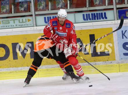 EBEL. Eishockey Bundesliga. KAC gegen	spusu Moser Medical Graz99ers.  Hundertpfund Thomas (KAC), Dodero Charles (Graz). Klagenfurt, am 30.12.2020.
Foto: Kuess
www.qspictures.net

---
pressefotos, pressefotografie, kuess, qs, qspictures, sport, bild, bilder, bilddatenbank