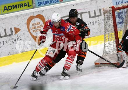EBEL. Eishockey Bundesliga. KAC gegen	spusu Moser Medical Graz99ers.  Haudum Lukas (KAC), Cameranesi Anthony (Graz). Klagenfurt, am 30.12.2020.
Foto: Kuess
www.qspictures.net

---
pressefotos, pressefotografie, kuess, qs, qspictures, sport, bild, bilder, bilddatenbank