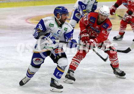 EBEL. Eishockey Bundesliga. KAC gegen	VSV. Clemens Unterweger,  (KAC),  Jerry Pollastrone (VSV). Klagenfurt, am 3.1.2021.
Foto: Kuess
www.qspictures.net

---
pressefotos, pressefotografie, kuess, qs, qspictures, sport, bild, bilder, bilddatenbank