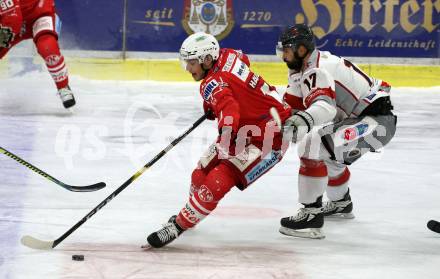 EBEL. Eishockey Bundesliga. KAC gegen	Bratislava Capitals. Lukas haudum,  (KAC), David Buc (Bratislava). Klagenfurt, am 10.1.2021.
Foto: Kuess
www.qspictures.net

---
pressefotos, pressefotografie, kuess, qs, qspictures, sport, bild, bilder, bilddatenbank