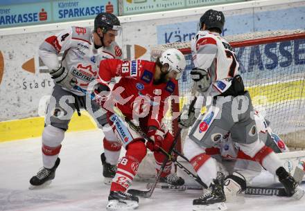 EBEL. Eishockey Bundesliga. KAC gegen	Bratislava Capitals. Daniel Obersteiner,  (KAC), Matthew Nicholas Finn, Milos Bubela (Bratislava). Klagenfurt, am 10.1.2021.
Foto: Kuess
www.qspictures.net

---
pressefotos, pressefotografie, kuess, qs, qspictures, sport, bild, bilder, bilddatenbank