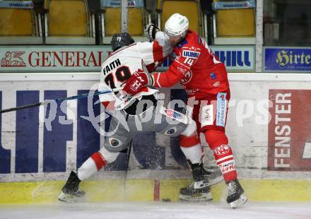EBEL. Eishockey Bundesliga. KAC gegen	Bratislava Capitals. Paul Postma,  (KAC), Roman Faith (Bratislava). Klagenfurt, am 10.1.2021.
Foto: Kuess
www.qspictures.net

---
pressefotos, pressefotografie, kuess, qs, qspictures, sport, bild, bilder, bilddatenbank