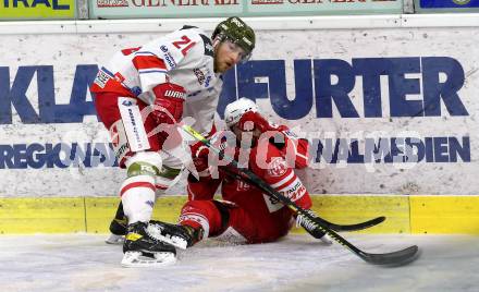 EBEL. Eishockey Bundesliga. KAC gegen	HCB Suedtirol Alperia. Rokk Ticar, (KAC), Dennis Robertson  (Bozen). Klagenfurt, am 12.1.2021.
Foto: Kuess
www.qspictures.net

---
pressefotos, pressefotografie, kuess, qs, qspictures, sport, bild, bilder, bilddatenbank