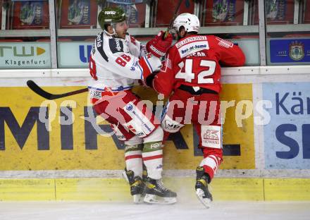 EBEL. Eishockey Bundesliga. KAC gegen	HCB Suedtirol Alperia. Rok Ticar,  (KAC), Domenico Alberga (Bozen). Klagenfurt, am 12.1.2021.
Foto: Kuess
www.qspictures.net

---
pressefotos, pressefotografie, kuess, qs, qspictures, sport, bild, bilder, bilddatenbank