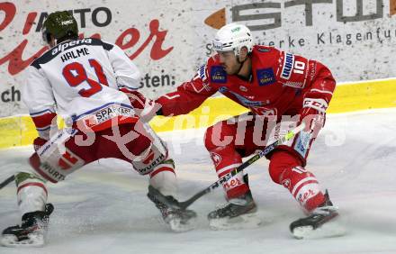 EBEL. Eishockey Bundesliga. KAC gegen	HCB Suedtirol Alperia. Thomas Vallant,  (KAC), Michael Halmo (Bozen). Klagenfurt, am 12.1.2021.
Foto: Kuess
www.qspictures.net

---
pressefotos, pressefotografie, kuess, qs, qspictures, sport, bild, bilder, bilddatenbank