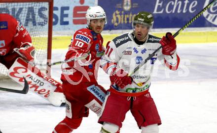 EBEL. Eishockey Bundesliga. KAC gegen	HCB Suedtirol Alperia. Thomas Valant,  (KAC), Michael Halmo (Bozen). Klagenfurt, am 12.1.2021.
Foto: Kuess
www.qspictures.net

---
pressefotos, pressefotografie, kuess, qs, qspictures, sport, bild, bilder, bilddatenbank