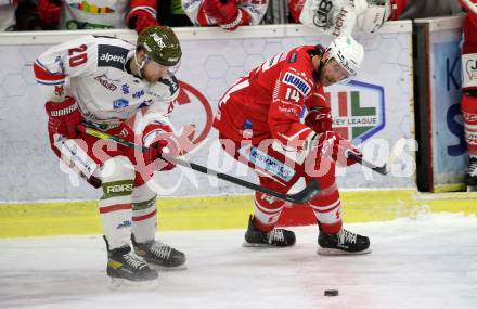 EBEL. Eishockey Bundesliga. KAC gegen	HCB Suedtirol Alperia. Paul Postma,  (KAC), Dennis Robertson (Bozen). Klagenfurt, am 12.1.2021.
Foto: Kuess
www.qspictures.net

---
pressefotos, pressefotografie, kuess, qs, qspictures, sport, bild, bilder, bilddatenbank
