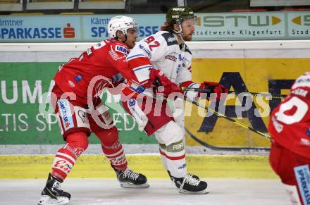 EBEL. Eishockey Bundesliga. KAC gegen	HCB Suedtirol Alperia. Lukas Haudum,  (KAC), Brett Findlay (Bozen). Klagenfurt, am 12.1.2021.
Foto: Kuess
www.qspictures.net

---
pressefotos, pressefotografie, kuess, qs, qspictures, sport, bild, bilder, bilddatenbank