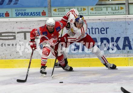 EBEL. Eishockey Bundesliga. KAC gegen	EC Red Bull Salzburg.  Strong Steven (KAC),  Huber Paul (Salzburg). Klagenfurt, am 15.1.2021.
Foto: Kuess
www.qspictures.net

---
pressefotos, pressefotografie, kuess, qs, qspictures, sport, bild, bilder, bilddatenbank