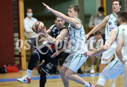 Basketball Zweite Liga 2020/2021. Grunddurchgang 16. Runde. KOS Celovec gegen BBC Nord Dragonz. Lovro Fizuleto (KOS Celovec), Dragisa Najdanovic  (BBC Nord Dragonz). Klagenfurt, am 16.1.2021.
Foto: Kuess
www.qspictures.net

---
pressefotos, pressefotografie, kuess, qs, qspictures, sport, bild, bilder, bilddatenbank