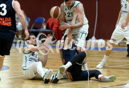 Basketball Zweite Liga 2020/2021. Grunddurchgang 16. Runde. KOS Celovec gegen BBC Nord Dragonz. Anze Kos, Marin Sliskovic (KOS Celovec), Dragisa Najdanovic  (BBC Nord Dragonz). Klagenfurt, am 16.1.2021.
Foto: Kuess
www.qspictures.net

---
pressefotos, pressefotografie, kuess, qs, qspictures, sport, bild, bilder, bilddatenbank