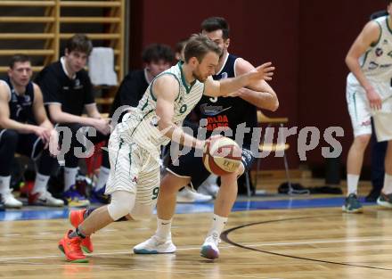 Basketball Zweite Liga 2020/2021. Grunddurchgang 16. Runde. KOS Celovec gegen BBC Nord Dragonz. Tim Huber (KOS Celovec), Petar Cosic  (BBC Nord Dragonz). Klagenfurt, am 16.1.2021.
Foto: Kuess
www.qspictures.net

---
pressefotos, pressefotografie, kuess, qs, qspictures, sport, bild, bilder, bilddatenbank