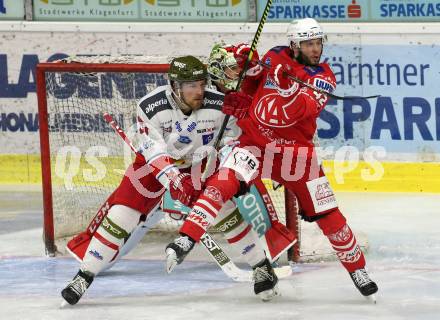 EBEL. Eishockey Bundesliga. KAC gegen	HCB Suedtirol Alperia. Rok Ticar,  (KAC), Robertson Dennis (Bozen). Klagenfurt, am 17.1.2021.
Foto: Kuess
www.qspictures.net

---
pressefotos, pressefotografie, kuess, qs, qspictures, sport, bild, bilder, bilddatenbank