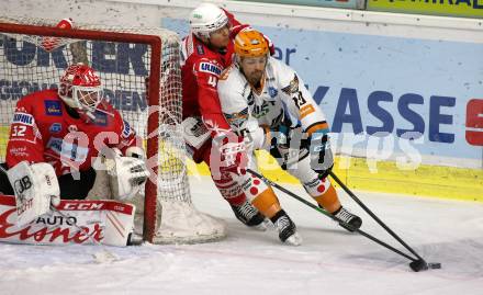EBEL. Eishockey Bundesliga. KAC gegen	Black Wings 1992 Linz. Sebastian Dahm, Kele Steffler,  (KAC), Andrew Jacob Kozek (Linz). Klagenfurt, am 24.1.2021.
Foto: Kuess
www.qspictures.net

---
pressefotos, pressefotografie, kuess, qs, qspictures, sport, bild, bilder, bilddatenbank
