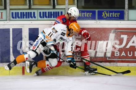 EBEL. Eishockey Bundesliga. KAC gegen	Black Wings 1992 Linz. Kele Steffler,  (KAC), Dennis Yan (Linz). Klagenfurt, am 24.1.2021.
Foto: Kuess
www.qspictures.net

---
pressefotos, pressefotografie, kuess, qs, qspictures, sport, bild, bilder, bilddatenbank