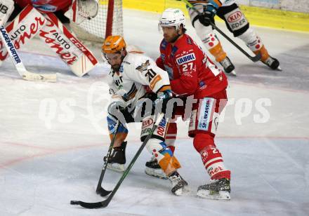 EBEL. Eishockey Bundesliga. KAC gegen	Black Wings 1992 Linz. Thomas Hundertpfund,  (KAC), Will Pelletier (Linz). Klagenfurt, am 24.1.2021.
Foto: Kuess
www.qspictures.net

---
pressefotos, pressefotografie, kuess, qs, qspictures, sport, bild, bilder, bilddatenbank