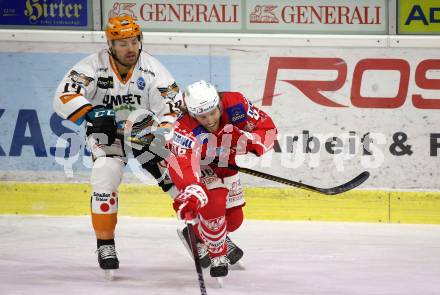 EBEL. Eishockey Bundesliga. KAC gegen	Black Wings 1992 Linz. Johannes Bischofberger,  (KAC), Andrew Jacob Kozek (Linz). Klagenfurt, am 24.1.2021.
Foto: Kuess
www.qspictures.net

---
pressefotos, pressefotografie, kuess, qs, qspictures, sport, bild, bilder, bilddatenbank
