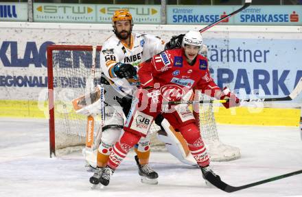 EBEL. Eishockey Bundesliga. KAC gegen	Black Wings 1992 Linz. Lukas haudum,  (KAC), Sebastien Piche (Linz). Klagenfurt, am 24.1.2021.
Foto: Kuess
www.qspictures.net

---
pressefotos, pressefotografie, kuess, qs, qspictures, sport, bild, bilder, bilddatenbank