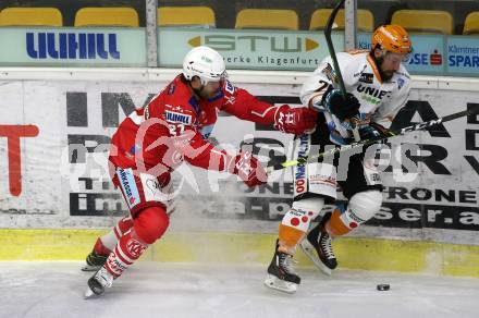 EBEL. Eishockey Bundesliga. KAC gegen	Black Wings 1992 Linz. Thomas Hundertpfund, (KAC), Will Pelletier  (Linz). Klagenfurt, am 24.1.2021.
Foto: Kuess
www.qspictures.net

---
pressefotos, pressefotografie, kuess, qs, qspictures, sport, bild, bilder, bilddatenbank