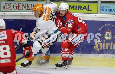 EBEL. Eishockey Bundesliga. KAC gegen	Black Wings 1992 Linz. Matthew Fraser,  (KAC), Oskars Bartulis  (Linz). Klagenfurt, am 24.1.2021.
Foto: Kuess
www.qspictures.net

---
pressefotos, pressefotografie, kuess, qs, qspictures, sport, bild, bilder, bilddatenbank