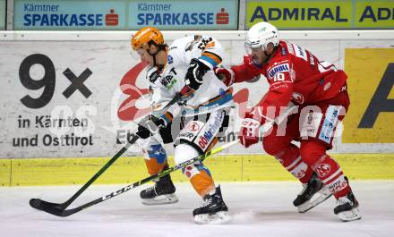 EBEL. Eishockey Bundesliga. KAC gegen	Black Wings 1992 Linz. Thomas Vallant,  (KAC), Stefan Gaffal (Linz). Klagenfurt, am 24.1.2021.
Foto: Kuess
www.qspictures.net

---
pressefotos, pressefotografie, kuess, qs, qspictures, sport, bild, bilder, bilddatenbank
