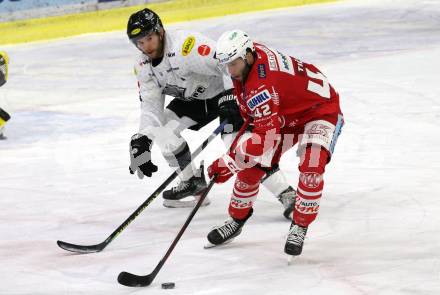 EBEL. Eishockey Bundesliga. KAC gegen	Dornbirner EC. Rok Ticar,  (KAC),  Matthew MacKenzie (Dornbirn). Klagenfurt, am 31.1.2021.
Foto: Kuess
www.qspictures.net

---
pressefotos, pressefotografie, kuess, qs, qspictures, sport, bild, bilder, bilddatenbank
