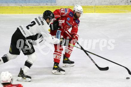 EBEL. Eishockey Bundesliga. KAC gegen	Dornbirner EC. Rok Ticar,  (KAC),  Olivier Magnan (Dornbirn). Klagenfurt, am 31.1.2021.
Foto: Kuess
www.qspictures.net

---
pressefotos, pressefotografie, kuess, qs, qspictures, sport, bild, bilder, bilddatenbank