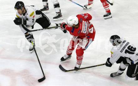 EBEL. Eishockey Bundesliga. KAC gegen	Dornbirner EC. Thomas Hundertpfund,  (KAC), Olivier Magnan (Dornbirn). Klagenfurt, am 31.1.2021.
Foto: Kuess
www.qspictures.net

---
pressefotos, pressefotografie, kuess, qs, qspictures, sport, bild, bilder, bilddatenbank