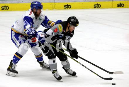 EBEL. Eishockey Bundesliga. VSV gegen Dornbirn Bulldogs.  Julian Kornelli, (VSV), Emilio Romig  (Dornbirn). Villach, am 14.2.2021.
Foto: Kuess
www.qspictures.net
---
pressefotos, pressefotografie, kuess, qs, qspictures, sport, bild, bilder, bilddatenbank