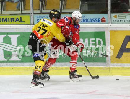 EBEL. Eishockey Bundesliga. KAC gegen	spusu Vienna Capitals.  Strong Steven (KAC),  Loney Ty (Vienna Capitals). Klagenfurt, am 14.2.2021.
Foto: Kuess
www.qspictures.net

---
pressefotos, pressefotografie, kuess, qs, qspictures, sport, bild, bilder, bilddatenbank