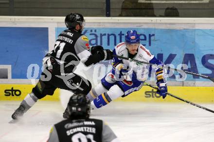 EBEL. Eishockey Bundesliga. VSV gegen Dornbirn Bulldogs.  Renars Krastenbergs,  (VSV),  Kevin Macierzynski (Dornbirn). Villach, am 14.2.2021.
Foto: Kuess
www.qspictures.net
---
pressefotos, pressefotografie, kuess, qs, qspictures, sport, bild, bilder, bilddatenbank