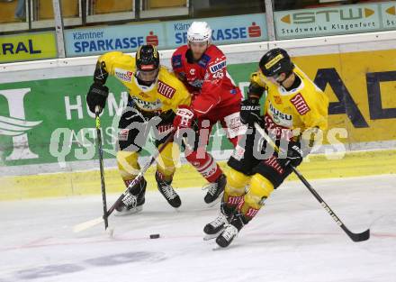 EBEL. Eishockey Bundesliga. KAC gegen	spusu Vienna Capitals. Bischofberger Johannes (KAC), Wukovits Ali, Richter Marco (Vienna Capitals). Klagenfurt, am 14.2.2021.
Foto: Kuess
www.qspictures.net

---
pressefotos, pressefotografie, kuess, qs, qspictures, sport, bild, bilder, bilddatenbank