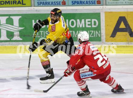 EBEL. Eishockey Bundesliga. KAC gegen	spusu Vienna Capitals. Schumnig Martin (KAC),  Archibald Darren (Vienna Capitals). Klagenfurt, am 14.2.2021.
Foto: Kuess
www.qspictures.net

---
pressefotos, pressefotografie, kuess, qs, qspictures, sport, bild, bilder, bilddatenbank
