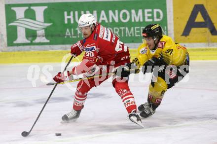 EBEL. Eishockey Bundesliga. KAC gegen	spusu Vienna Capitals. Fraser Matthew (KAC), Vause Taylor (Vienna Capitals). Klagenfurt, am 14.2.2021.
Foto: Kuess
www.qspictures.net

---
pressefotos, pressefotografie, kuess, qs, qspictures, sport, bild, bilder, bilddatenbank