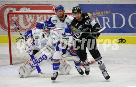 EBEL. Eishockey Bundesliga. VSV gegen Dornbirn Bulldogs. Kevin Schmidt,  (VSV), Vitalijs Pavlovs  (Dornbirn). Villach, am 14.2.2021.
Foto: Kuess
www.qspictures.net
---
pressefotos, pressefotografie, kuess, qs, qspictures, sport, bild, bilder, bilddatenbank